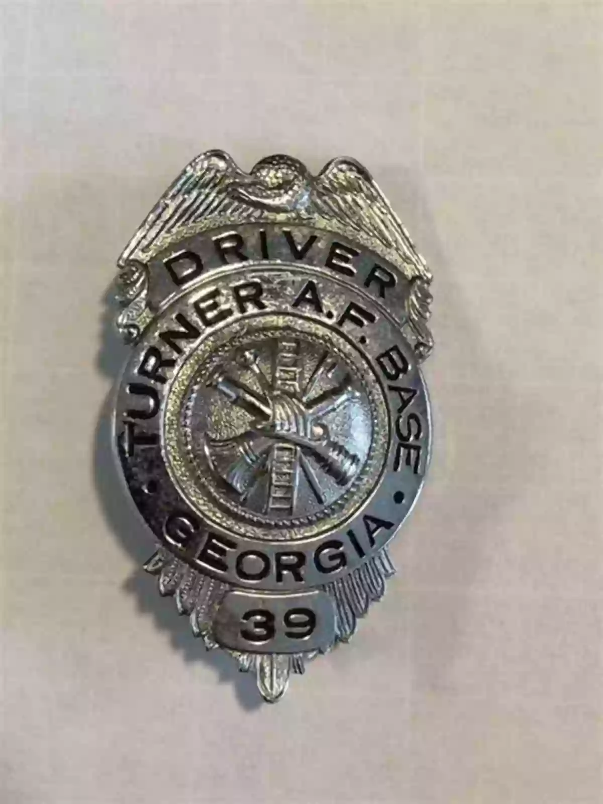 A Close Up Of Pat Turner's Firefighter Badge The Firefighter Badge Pat Turner