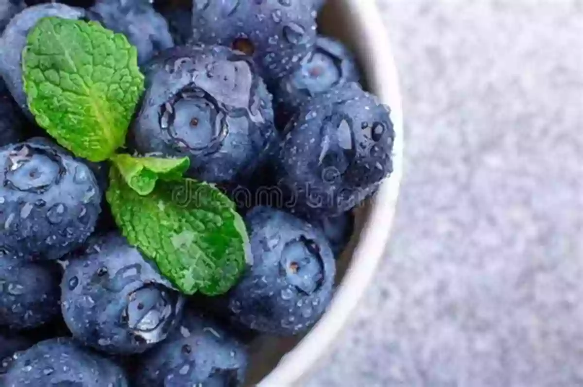 A Bowl Of Juicy Blueberries With Droplets Of Water On Top Blueberries Kwame Alexander