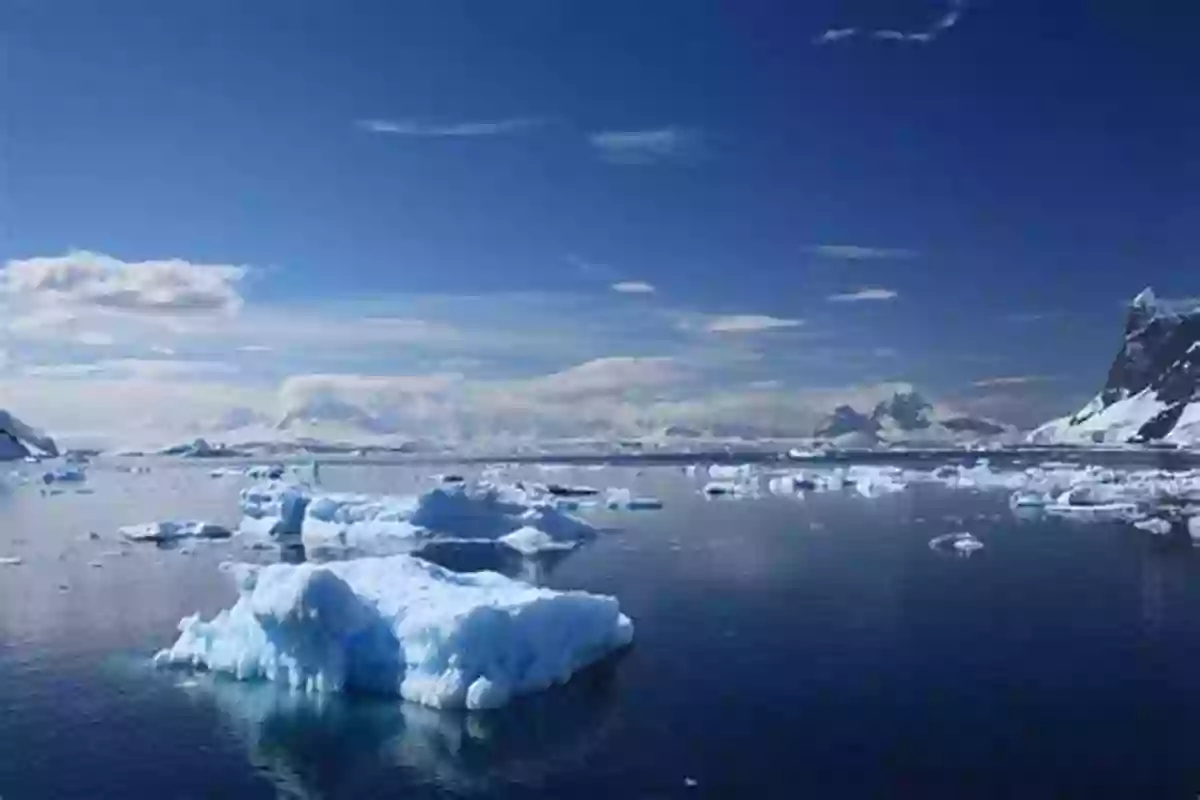 A Breathtaking View Of Antarctica's Glaciers And Icebergs Under A Clear Blue Sky Exploring The Last Continent: An To Antarctica