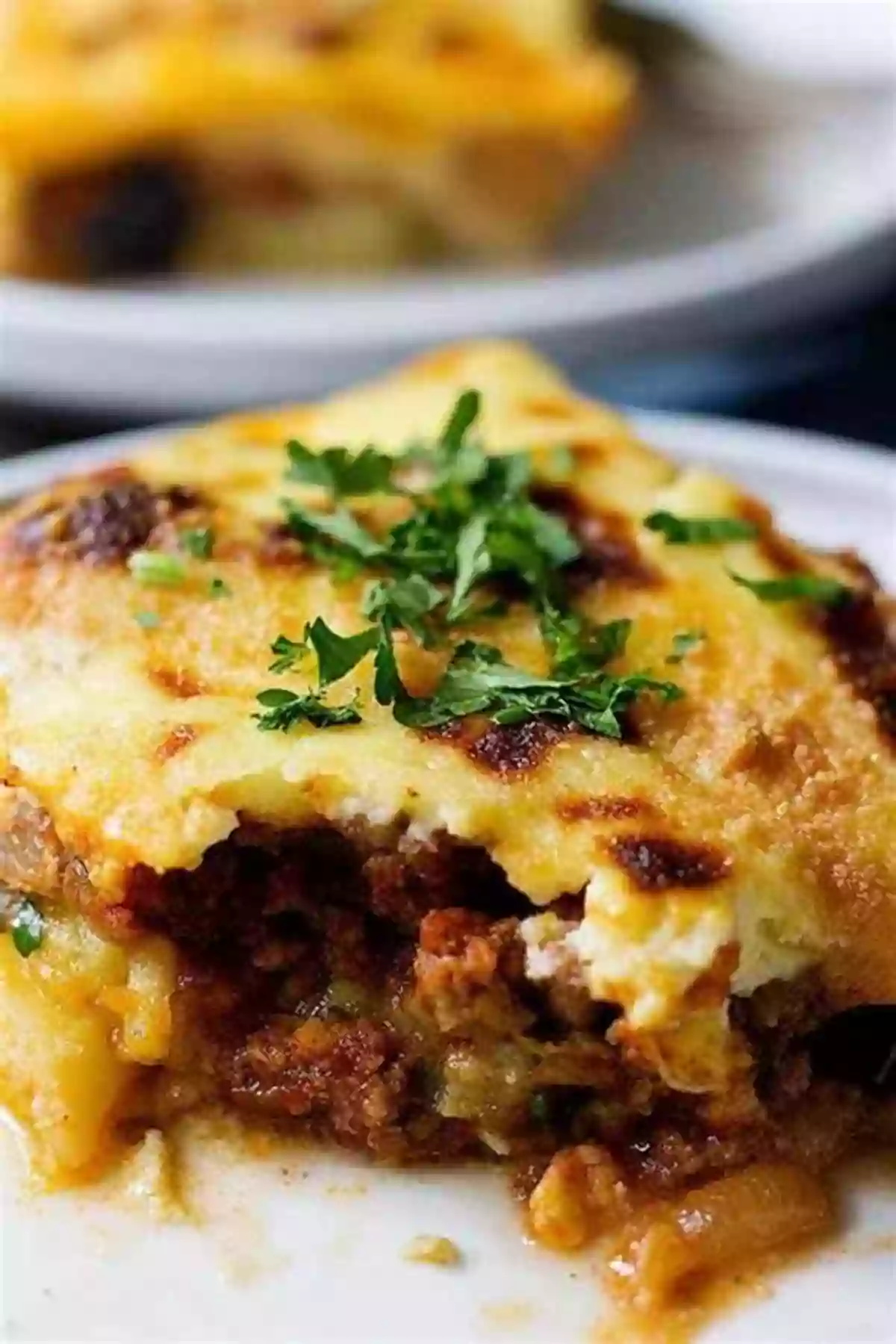 A Delicious Moussaka Casserole With Layers Of Eggplant, Meat, And Béchamel Sauce The Delicious Homemade Greek Food: The Greek Recipes Collection You Will Love