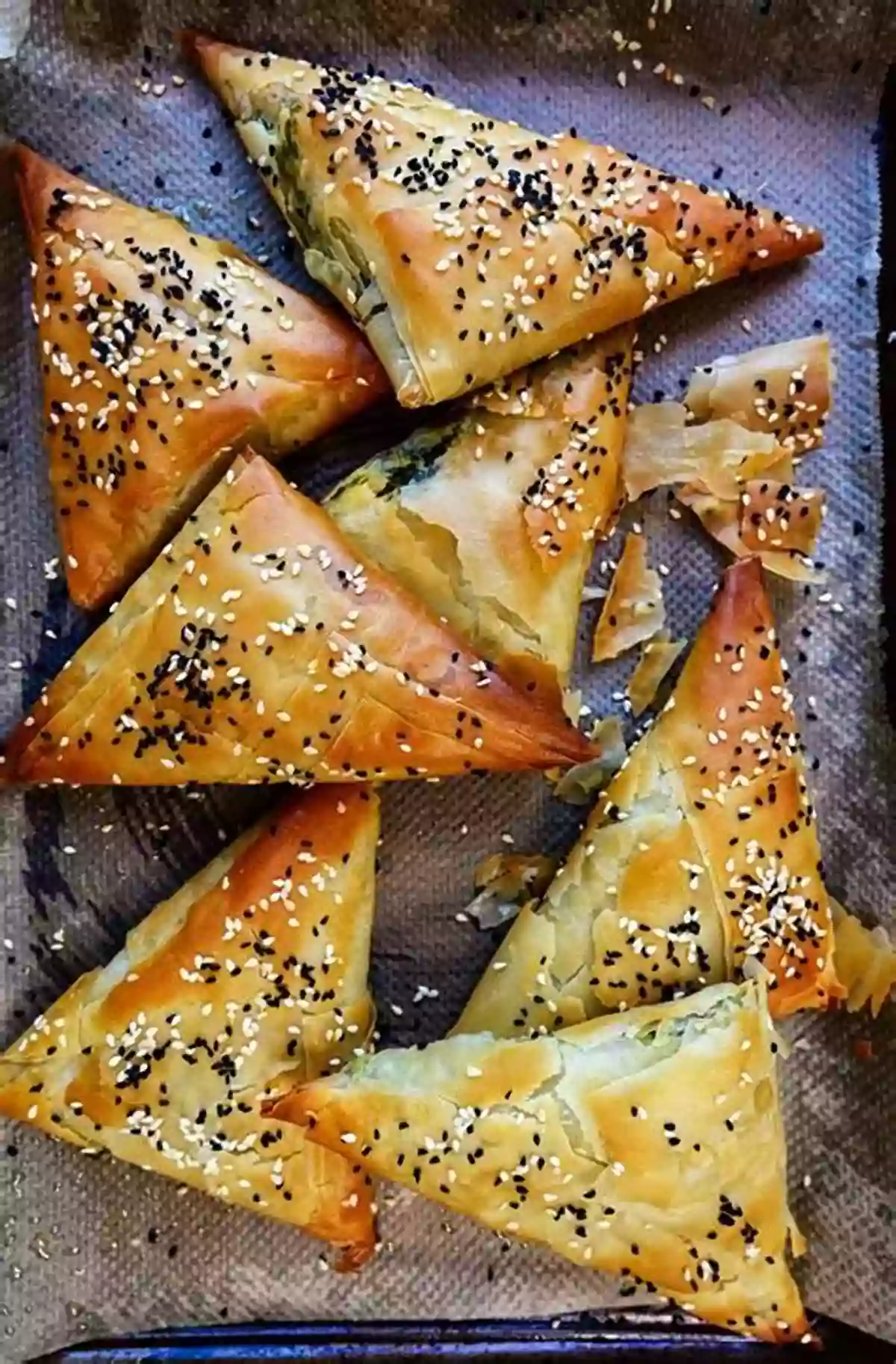 A Delicious Slice Of Spanakopita With Layers Of Crispy Phyllo Dough And Spinach Filling The Delicious Homemade Greek Food: The Greek Recipes Collection You Will Love