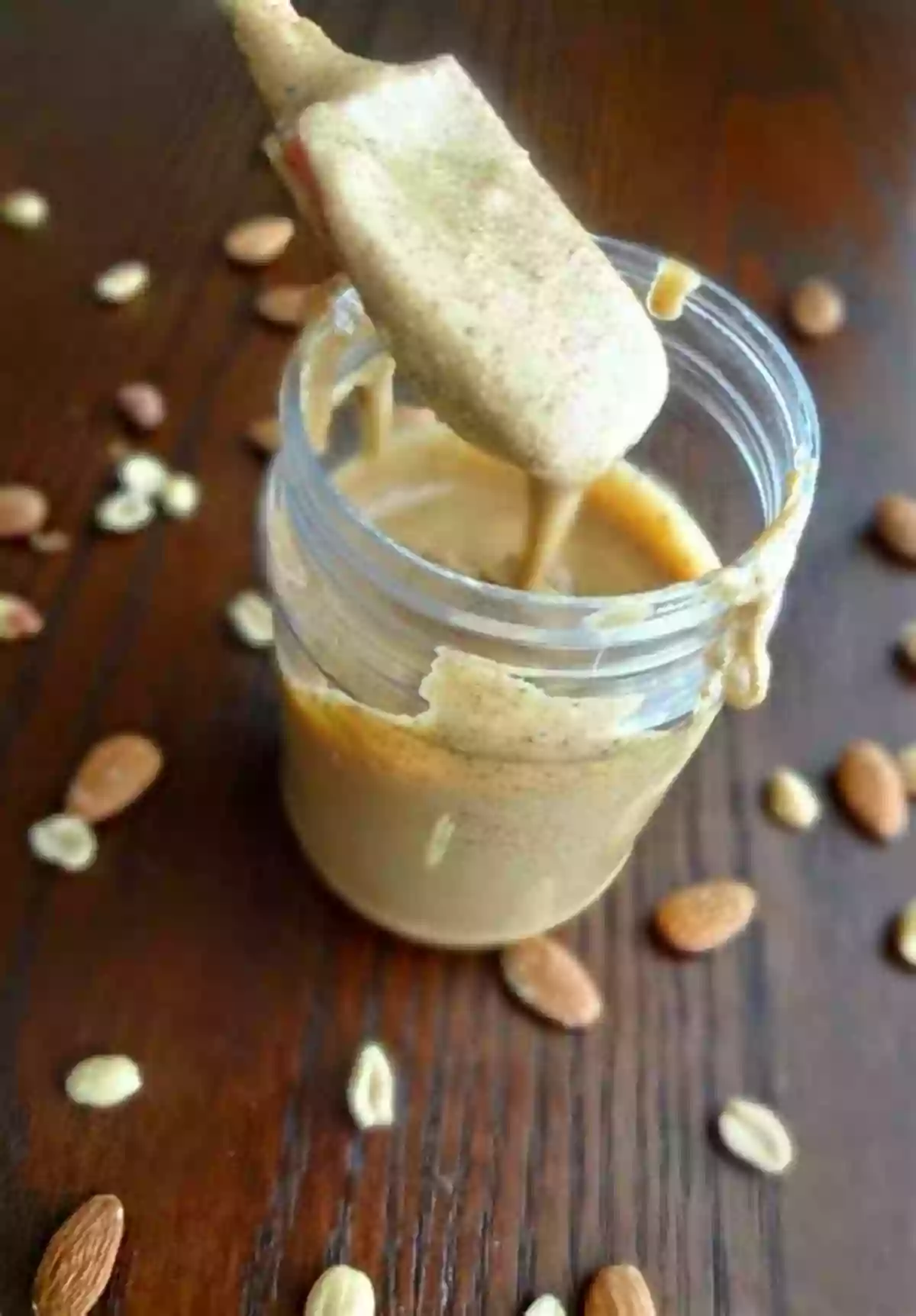 A Jar Of Nut Butter With Almonds And Peanuts 60 Foods To Stockpile:: Learn What Food To Store And What Processed Food Will Maintain Your And Your Family Health For A Long Time