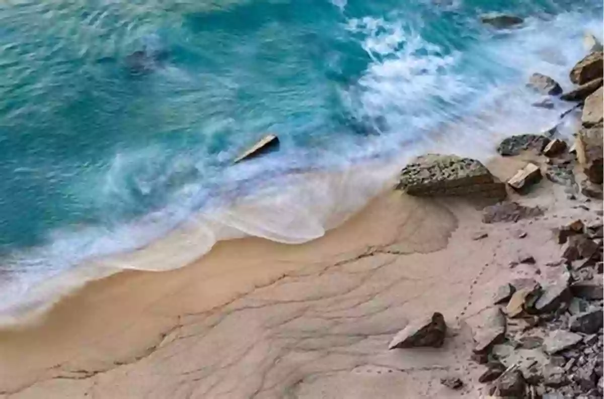 A Mesmerizing View Of Crashing Ocean Waves On A Picturesque Beach. Feel The Soothing Sea Breeze And Invigorate Your Senses. Ocean Waves And Oscillating Systems: Linear Interactions Including Wave Energy Extraction (Cambridge Ocean Technology 8)