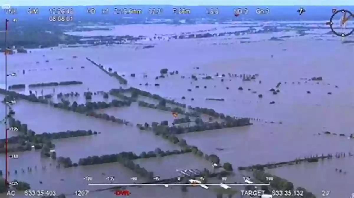 An Aerial View Of A Devastating Flood Flowing Through A City What Are Floods? (Wicked Weather)