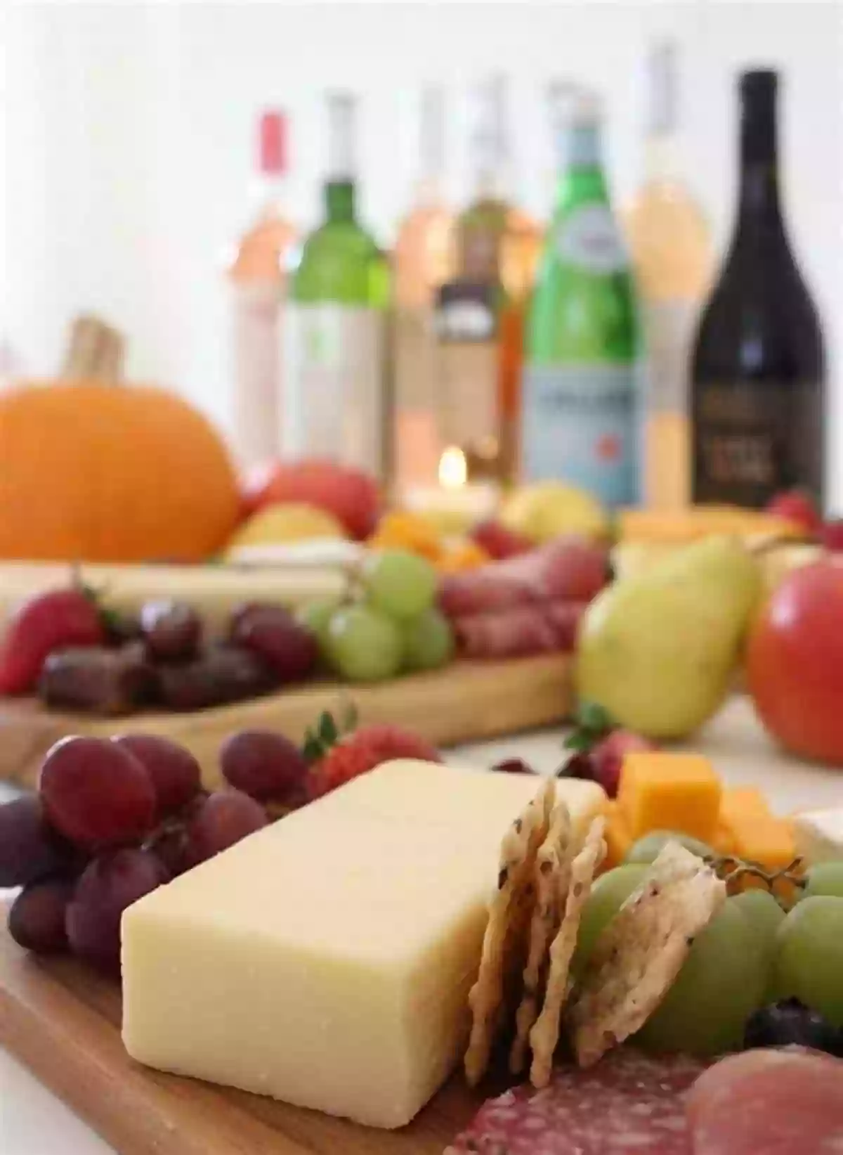 Artfully Arranged Cheese And Wine On A Charcuterie Board CHEESE WINE: HOW TO DINE WITH CHEESE AND WINE: Dazzle Your Guests With These Quick And Easy Tips