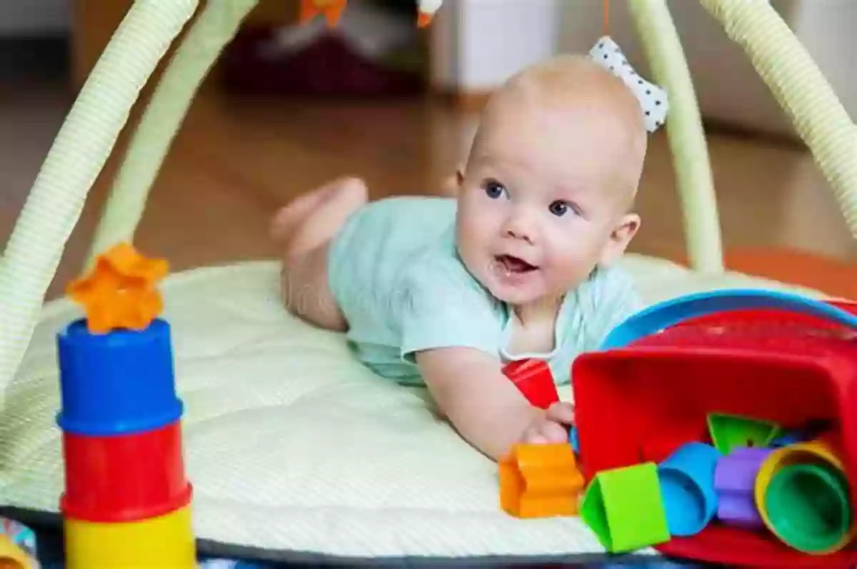 Baby Playing With Colorful And Interactive Toys Smile Baby Smile (Bouncing Baby)