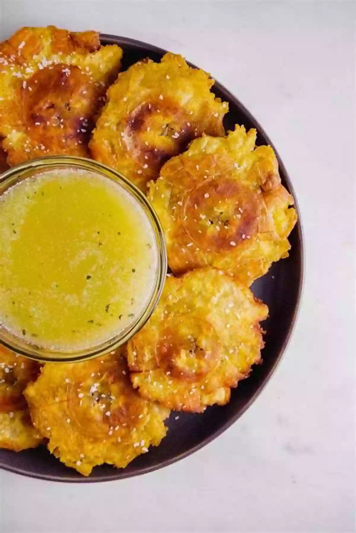 Crispy Tostones Served With A Dipping Sauce Cuban Cookbook: Traditional Cuban Recipes Made Easy: Cuban Recipes With Ground Beef