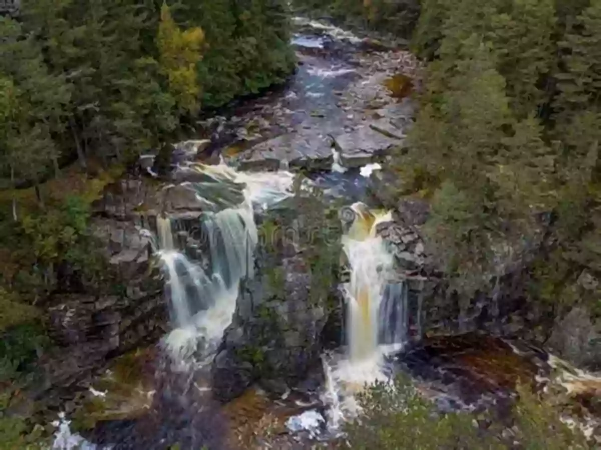 Hidden Waterfall Cascading Down A Mountain Covered In Lush Greenery Mountains In Pictures Eugene H Peterson