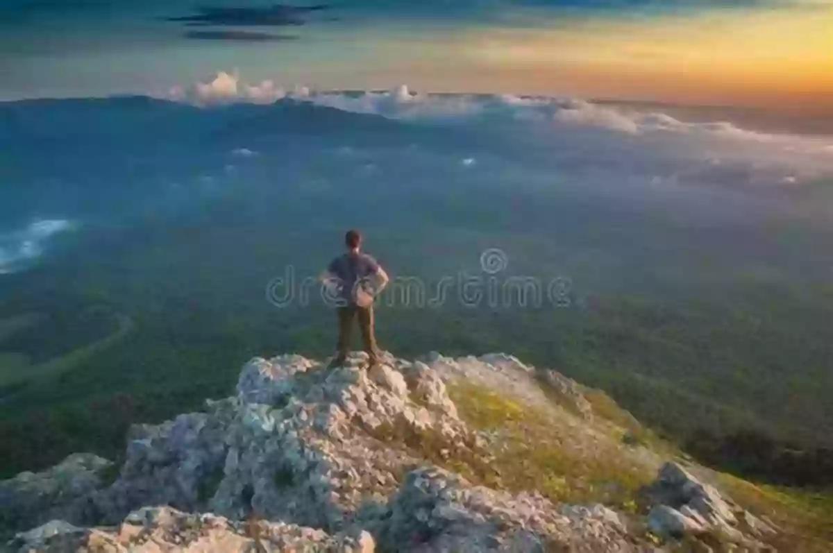 Hiker Standing On A Rocky Edge, Surrounded By Lush Mountains Mountains In Pictures Eugene H Peterson