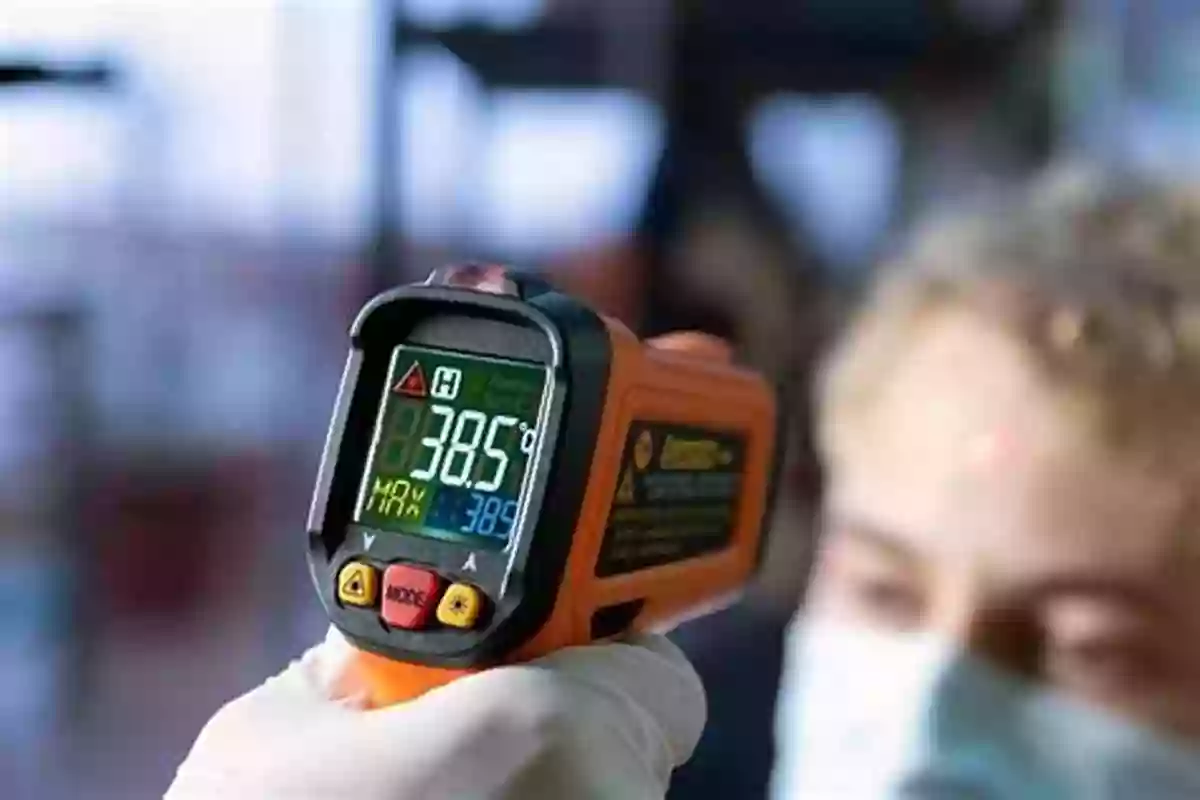 Infrared Thermometer Being Pointed At A Person's Forehead Non Invasive Thermometry Of The Human Body