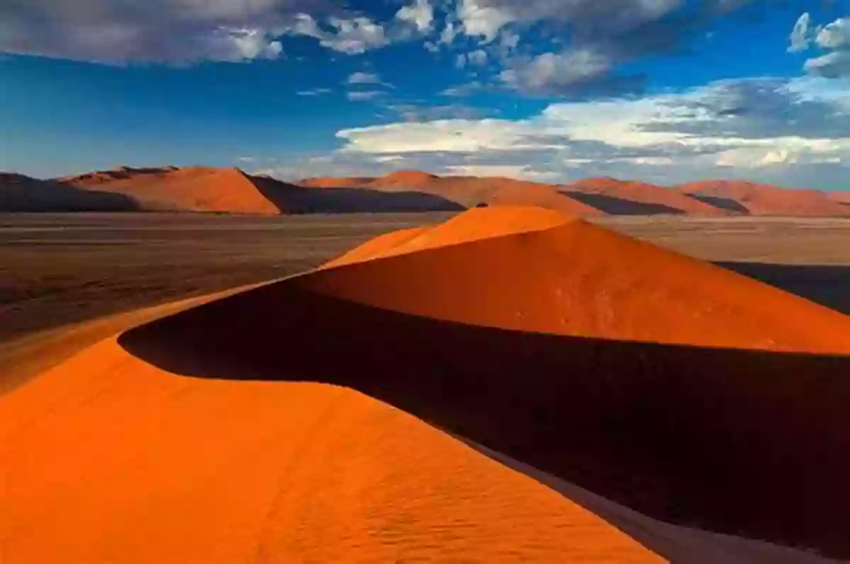 The Mesmerizing Dunes Of The Namib Desert, Where Shades Of Orange And Red Paint A Stunning Portrait The Living Deserts Of Southern African